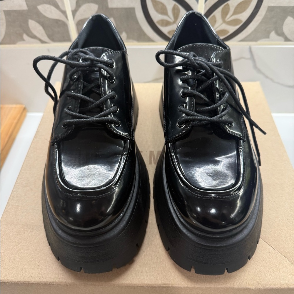 Madden Girl Glossy Black Lace-Up Flats